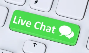 Customer Support Services image featuring 'Live Chat' text and an email icon on a keyword-themed background